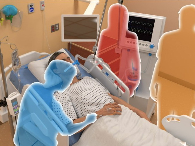 A virtual hospital room, featuring a simulated patient and three user avatars