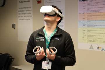 A man wearing a virtual reality headset
